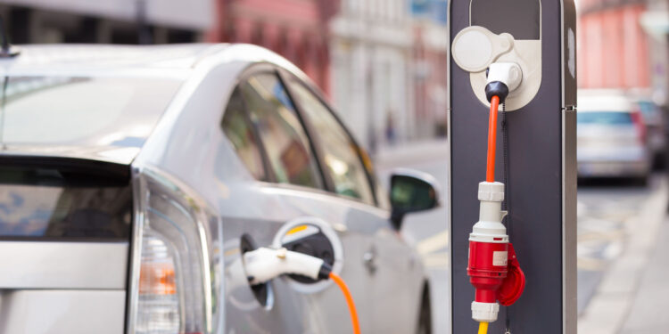 Electric Car in Charging Station.